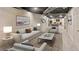 Spacious finished basement with recreational area, stylish décor, and ample lighting at 1460 Lakemist Ct, Roswell, GA 30075