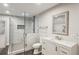 Updated bathroom with tiled shower, modern vanity, and sleek fixtures for a spa-like experience at 1460 Lakemist Ct, Roswell, GA 30075