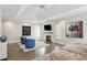 Main bedroom boasts fireplace, lots of natural light, and hardwood floors at 1460 Lakemist Ct, Roswell, GA 30075