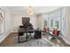 Bright office space with hardwood floors, natural light, and decorative chandelier at 1460 Lakemist Ct, Roswell, GA 30075