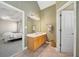 Bathroom with a vanity, tile floor, and entrance to the bedroom at 2528 Picket Fence Ln, Snellville, GA 30078