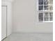 Cozy room with light walls and carpeting at 2528 Picket Fence Ln, Snellville, GA 30078