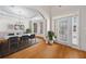 Dining room featuring hardwood floors, table setting, and bay window at 2528 Picket Fence Ln, Snellville, GA 30078