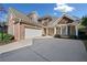Charming two-story brick home with a large driveway and attached two-car garage at 2528 Picket Fence Ln, Snellville, GA 30078
