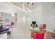 Airy living room featuring a high ceiling and an open floor plan at 2528 Picket Fence Ln, Snellville, GA 30078