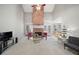 Spacious living room with a brick fireplace and large windows at 2528 Picket Fence Ln, Snellville, GA 30078