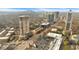 An aerial view highlights the complex's urban location, with easy access to city amenities and a vibrant cityscape at 2855 Peachtree Ne Rd # 302, Atlanta, GA 30305