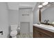 Clean bathroom with modern vanity, toilet and new paint at 2855 Peachtree Ne Rd # 302, Atlanta, GA 30305