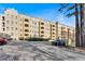 Exterior shot of building with parking available, mature trees, and classic architectural design at 2855 Peachtree Ne Rd # 302, Atlanta, GA 30305