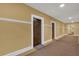 Neutral hallway with classic molding, and apartment doors for quiet, comfortable living at 2855 Peachtree Ne Rd # 302, Atlanta, GA 30305