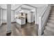 Open-concept living space featuring hardwood floors and easy access to the kitchen at 2855 Peachtree Ne Rd # 302, Atlanta, GA 30305