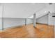 Spacious living room with hardwood flooring, neutral gray walls, and plenty of natural light at 2855 Peachtree Ne Rd # 302, Atlanta, GA 30305