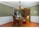 Traditional dining room with hardwood floors and elegant chandelier at 1760 Clayton Cir, Cumming, GA 30040