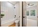 Well-lit bathroom featuring white subway tile in the shower and modern fixtures at 2788 Browns Mill Se Rd, Atlanta, GA 30354