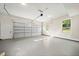 Large, clean garage space with natural light from the windows at 2788 Browns Mill Se Rd, Atlanta, GA 30354