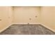 Unfinished basement with carpet and utility hookups at 573 Ripplewater Sw Dr, Marietta, GA 30064