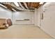 Spacious unfinished basement with exposed ceiling and storage at 573 Ripplewater Sw Dr, Marietta, GA 30064