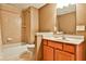 Bathroom featuring a shower, a sink and mirror at 573 Ripplewater Sw Dr, Marietta, GA 30064