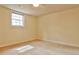 Bedroom featuring neutral carpet, a ceiling fan, and a window at 573 Ripplewater Sw Dr, Marietta, GA 30064