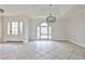 Spacious foyer with a grand entrance, large windows, and stylish lighting at 573 Ripplewater Sw Dr, Marietta, GA 30064