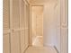 Hallway with closet and built-in cabinets, offering plenty of storage space at 573 Ripplewater Sw Dr, Marietta, GA 30064