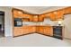 Kitchen with wood cabinets and appliances at 573 Ripplewater Sw Dr, Marietta, GA 30064