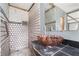 Unique bathroom design with a modern vessel sink and tiled shower at 6219 Holly Ann Se St, Acworth, GA 30102