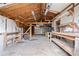 Spacious garage interior with open shelving and workbench areas at 6219 Holly Ann Se St, Acworth, GA 30102