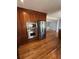 Gourmet kitchen boasts stainless steel appliances, custom cabinets, granite countertops and hardwood floors at 6470 Wright Cir, Atlanta, GA 30328