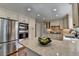 This Kitchen features stainless appliances, a view to more of the kitchen and granite countertops at 1643 North Springs Dr, Dunwoody, GA 30338