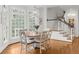 Bright dining area featuring large windows, hardwood floors, and space for Gathering dining at 4655 Jett Rd, Atlanta, GA 30327