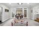 Sitting room featuring French doors and floral ottoman at 4655 Jett Rd, Atlanta, GA 30327