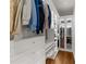 Organized walk-in closet with custom shelving, drawers, and ample storage space at 4655 Jett Rd, Atlanta, GA 30327