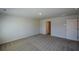 Bedroom with carpet and view of a door leading to another room at 67 Highgrove Way, Dallas, GA 30157