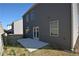 Exterior view showing back of home, patio, and gray siding at 67 Highgrove Way, Dallas, GA 30157