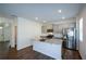 Kitchen featuring a center island, stainless steel appliances, gray cabinets, and granite countertops at 67 Highgrove Way, Dallas, GA 30157