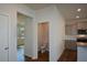 Convenient first-floor powder room is located just off the living room and kitchen at 67 Highgrove Way, Dallas, GA 30157