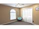 Empty bedroom with neutral walls, carpet, a ceiling fan, a window, and a closet at 2674 Misty Rock Cv, Dacula, GA 30019