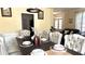 Open dining area with a dining table, and a view of the entryway and living room at 2674 Misty Rock Cv, Dacula, GA 30019