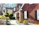 Charming brick home with elegant black shutters and beautiful landscaping at 2674 Misty Rock Cv, Dacula, GA 30019