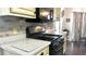 Kitchen with granite countertops, a gas range, and tiled backsplash, perfect for culinary enthusiasts at 2674 Misty Rock Cv, Dacula, GA 30019