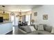 Bright living space with an open view of the dining area and kitchen, enhancing the home's appeal at 2674 Misty Rock Cv, Dacula, GA 30019