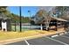 Enjoy a game of tennis at the community's well-maintained tennis courts near a covered cabana at 2674 Misty Rock Cv, Dacula, GA 30019