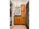 Stylish bathroom featuring custom wood cabinets, granite countertop, and modern fixtures at 1261 Lavista Ne Rd # E9, Atlanta, GA 30324