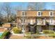 Charming townhouse with brick facade, landscaped grounds and inviting outdoor spaces at 1261 Lavista Ne Rd # E9, Atlanta, GA 30324