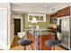 Stylish kitchen featuring stainless steel appliances, and seating at island at 1261 Lavista Ne Rd # E9, Atlanta, GA 30324