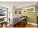 Spacious kitchen featuring a center island with granite countertop and stainless steel sink at 1261 Lavista Ne Rd # E9, Atlanta, GA 30324