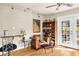 Cozy living area with hardwood floors, bookshelf and access to outdoor space at 1261 Lavista Ne Rd # E9, Atlanta, GA 30324