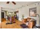 Open-concept living area featuring kitchen, hardwood floors, and lots of sunlight at 1261 Lavista Ne Rd # E9, Atlanta, GA 30324