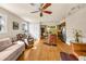 Bright, airy living space featuring hardwood floors, kitchen, and home office at 1261 Lavista Ne Rd # E9, Atlanta, GA 30324